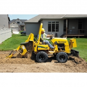 Vermeer RT450 Ride-on tractor w/ optional trencher and plow.