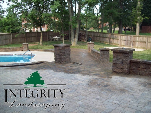 Tiered Paver Patios Lead to Pool