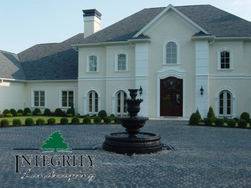 A Grand Fountain as a Driveway Centerpiece