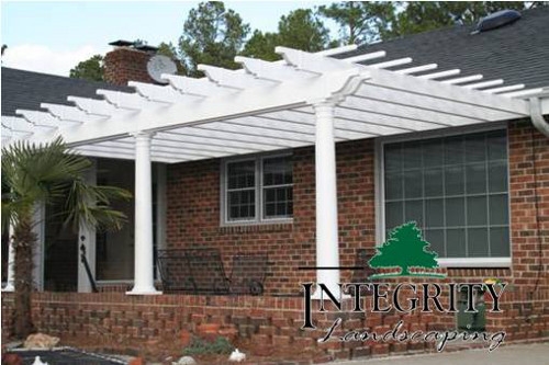 White Pergola Added to an Existing Structure