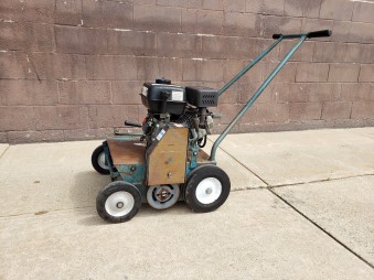 Bluebird power rake with bagger top