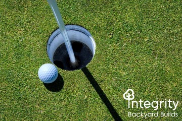 Golf Ball Next to Hole on Greens