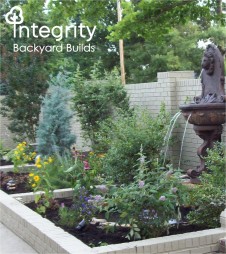 Raised Bed Garden with a Lion Fountain